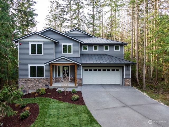 view of front of home with a porch and a garage