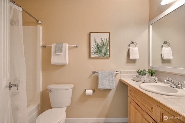 full bathroom with vanity, toilet, and shower / tub combo