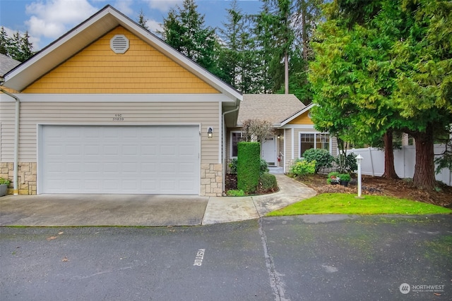 view of front of property with a garage