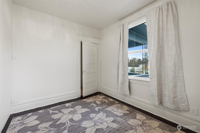 empty room featuring hardwood / wood-style floors