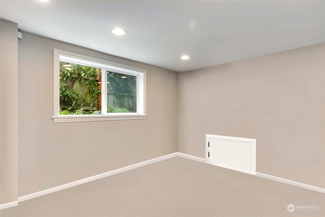 unfurnished room featuring carpet flooring