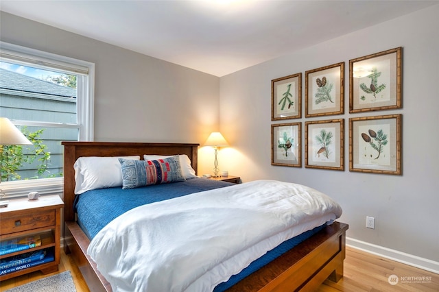 bedroom featuring light hardwood / wood-style floors