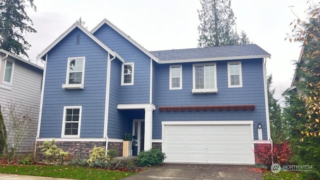 view of front of house with a garage