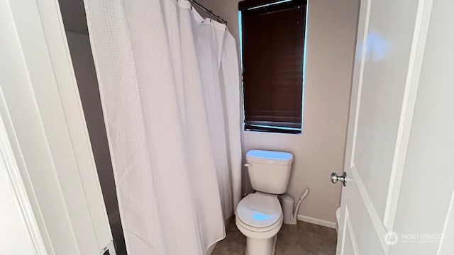 bathroom featuring toilet