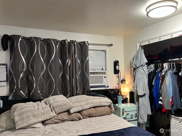 bedroom featuring cooling unit