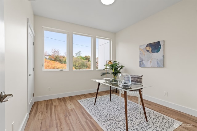 home office with light wood-type flooring