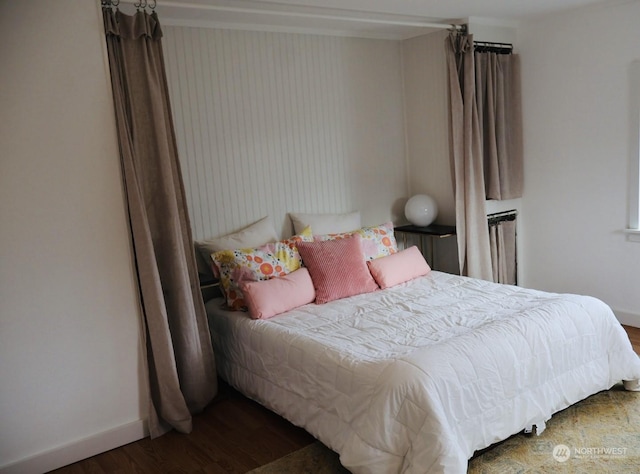 bedroom featuring dark wood-type flooring