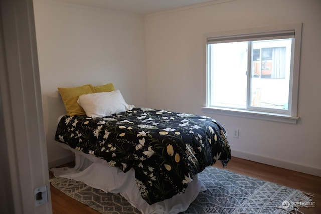 bedroom featuring wood-type flooring