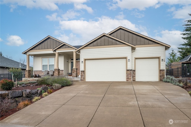 craftsman-style home with a garage