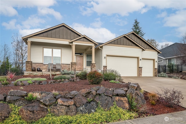 craftsman inspired home with a garage