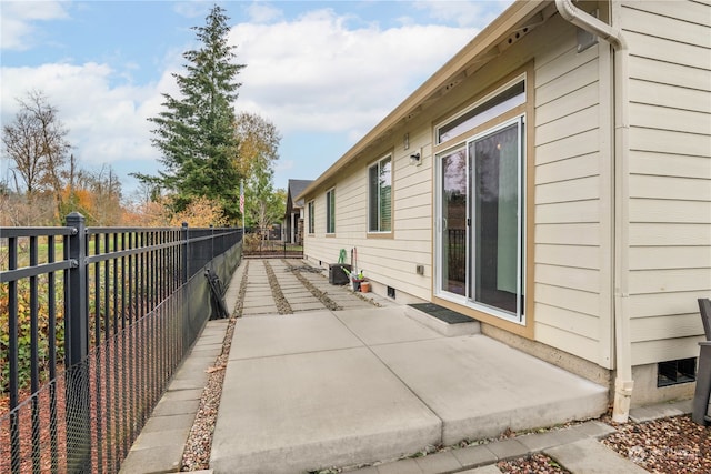 view of property exterior featuring a patio