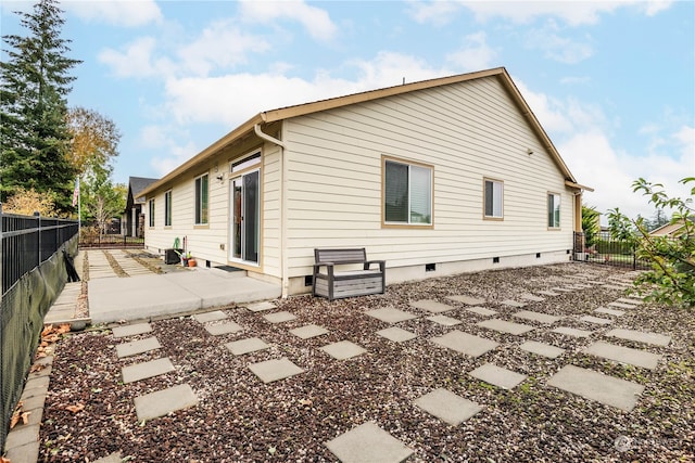 back of house with a patio area