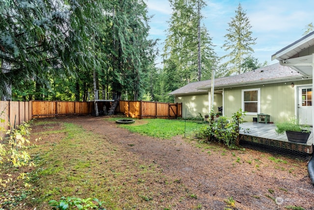 view of yard featuring a deck