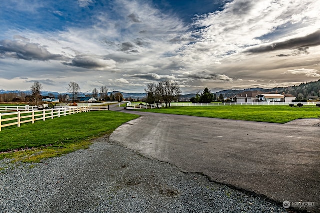 view of road featuring a mountain view and a rural view