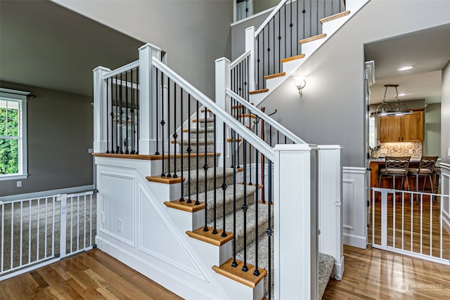 stairway with wood-type flooring