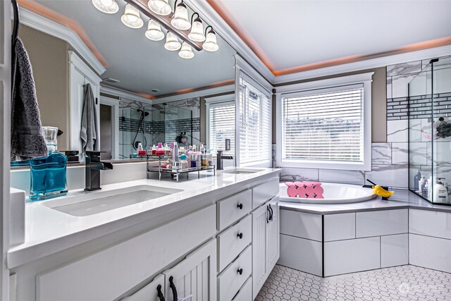 bathroom with separate shower and tub, crown molding, tile patterned flooring, and vanity