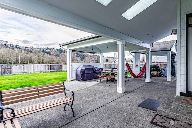 view of patio / terrace featuring a mountain view and area for grilling