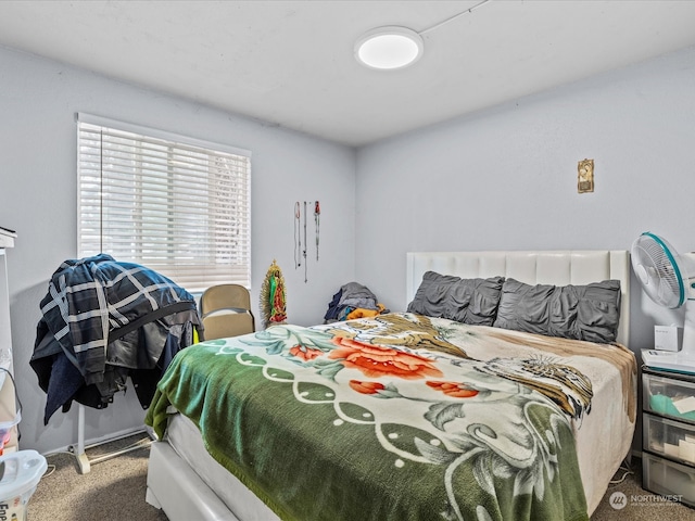 bedroom featuring carpet