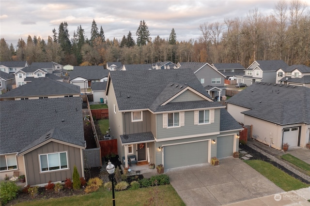 view of front of property with a garage