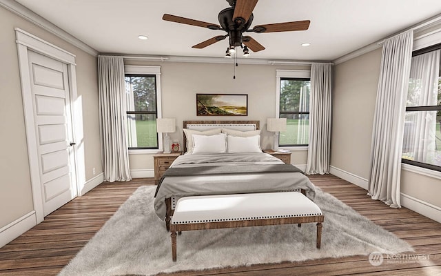 bedroom featuring hardwood / wood-style floors, ceiling fan, and ornamental molding