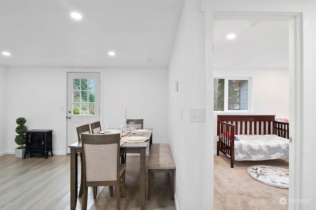 dining area with light hardwood / wood-style floors