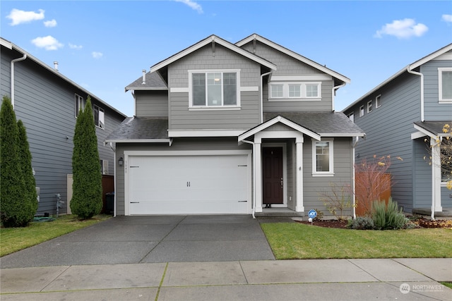 view of front of property with a garage