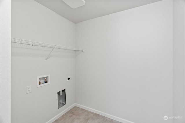 18619 11th Avenue Ct E, Spanaway, WA 98387 - laundry room featuring washer hookup, electric dryer hookup, baseboards, and light carpet
