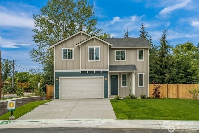 view of front facade with a garage and a front lawn