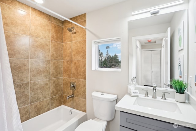 full bathroom with vanity, toilet, and shower / tub combo with curtain