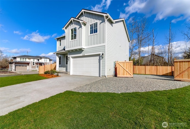 view of front of house with board and batten siding, fence, a garage, driveway, and a gate