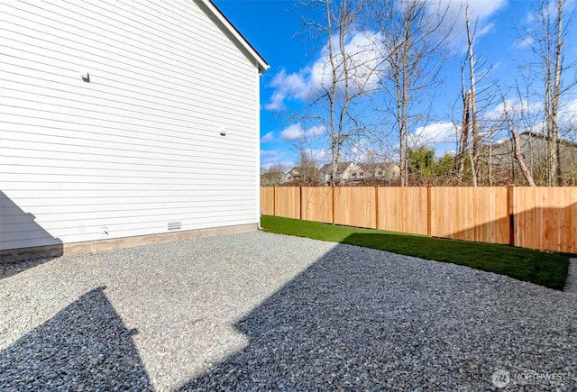 view of yard with a patio and fence