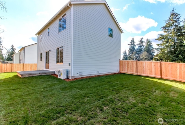 back of house featuring a yard, crawl space, a fenced backyard, and ac unit