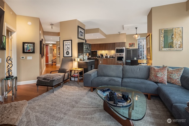 living room with wood-type flooring