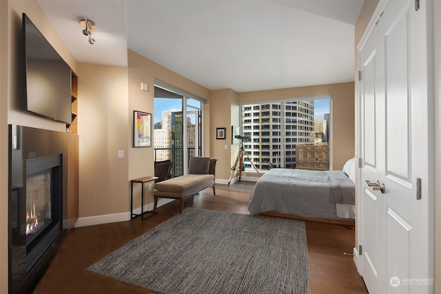 bedroom featuring dark hardwood / wood-style floors