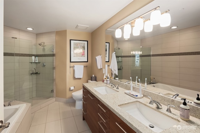 full bathroom featuring tile patterned flooring, vanity, toilet, and shower with separate bathtub