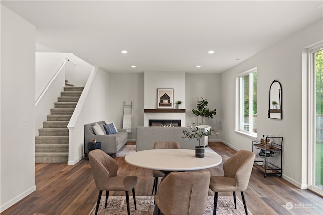 dining space featuring hardwood / wood-style flooring