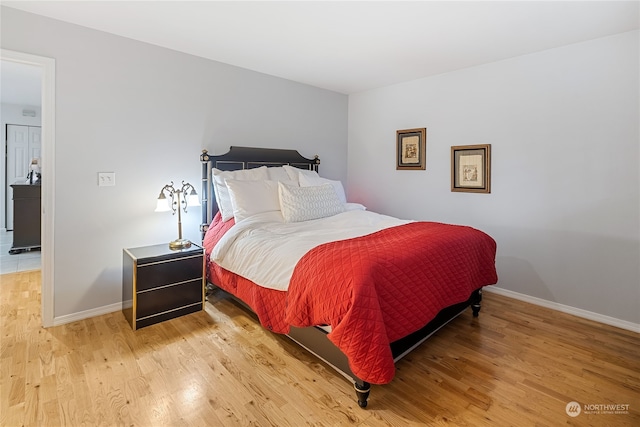 bedroom featuring hardwood / wood-style floors