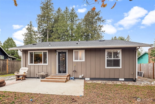 back of property featuring a patio area