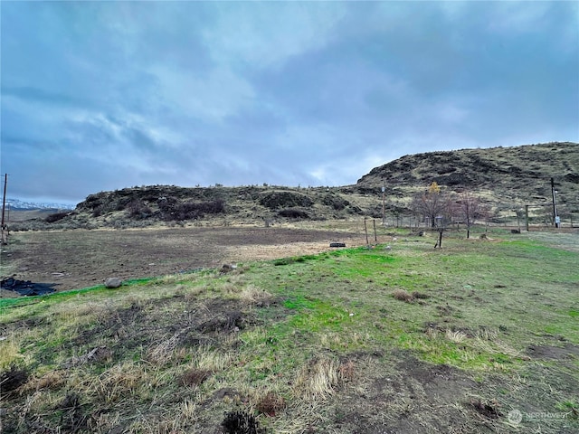 property view of mountains with a rural view