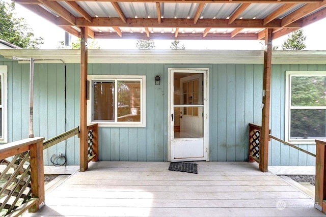 doorway to property featuring a deck