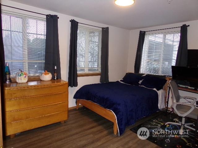 64246 Montclair Ave SW, Lakewood, WA 98499 - bedroom with wood finished floors and baseboards