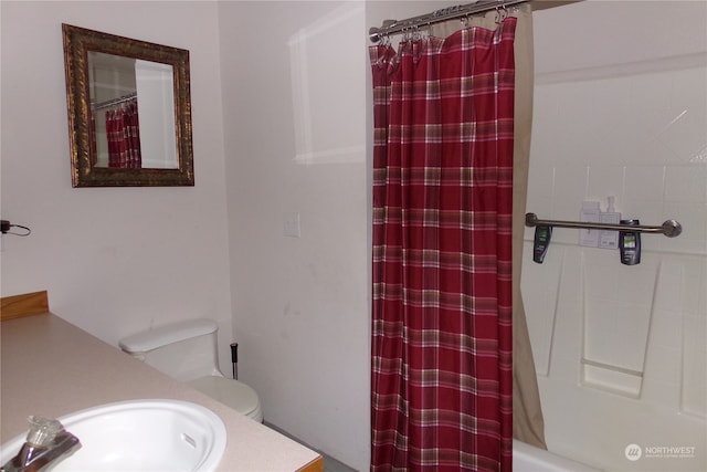 full bathroom with vanity, toilet, and shower / tub combo