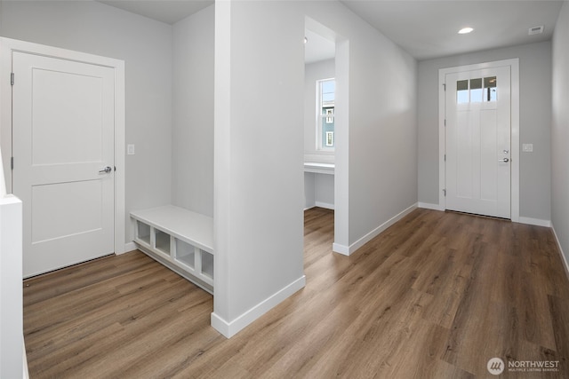 entryway featuring recessed lighting, visible vents, baseboards, and light wood finished floors