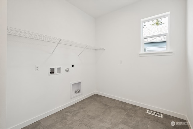 washroom featuring hookup for an electric dryer, hookup for a gas dryer, and washer hookup