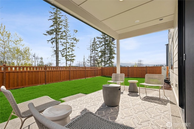 view of patio featuring a fenced backyard