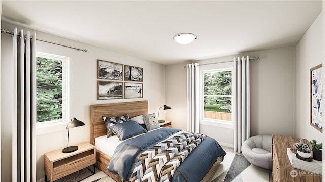 bedroom featuring carpet flooring and multiple windows