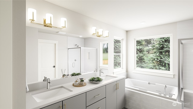 bathroom featuring vanity and separate shower and tub