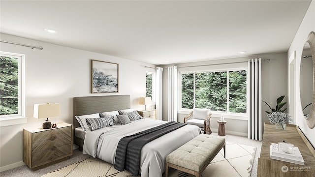 carpeted bedroom with multiple windows