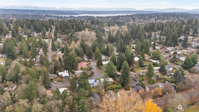 drone / aerial view featuring a mountain view