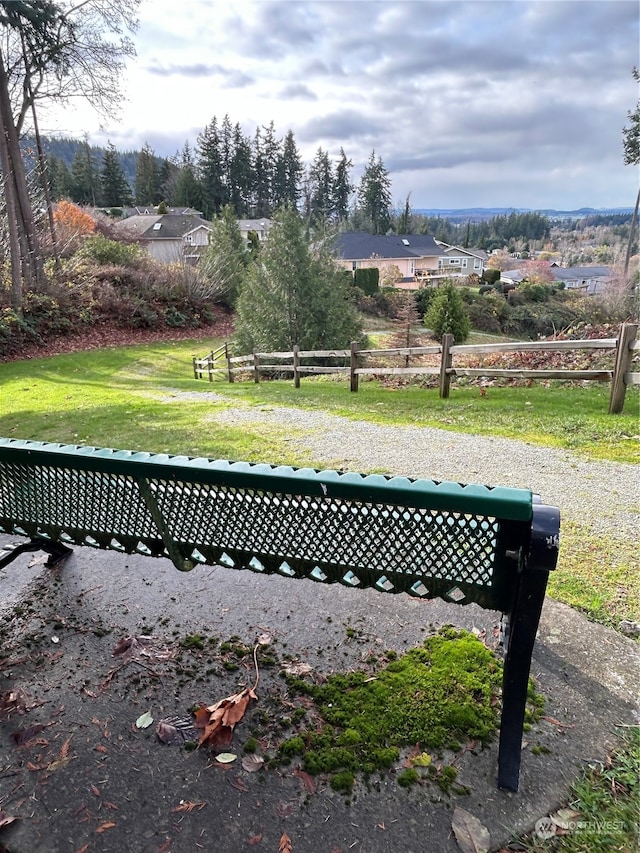 view of community featuring a yard